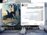 Ritorno al Castello (1969), Giorgio de Chirico: la tavola compone due caratteristiche delle aure da emicrania nel loro ciclo combinato: lo scotoma (presenza di una zona cieca nel campo visivo, dal punto centrale nero) e i motivi a zig-zag. marchettiiposter1bpicasso.jpg image by beppedeleonardis