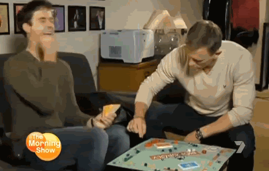 Daniel-Craig-Knocking-Over-Monopoly-Board-SNL-1.gif
